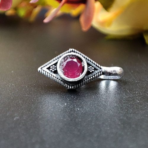 Elegant oxidised stone nosepin with press design for girls