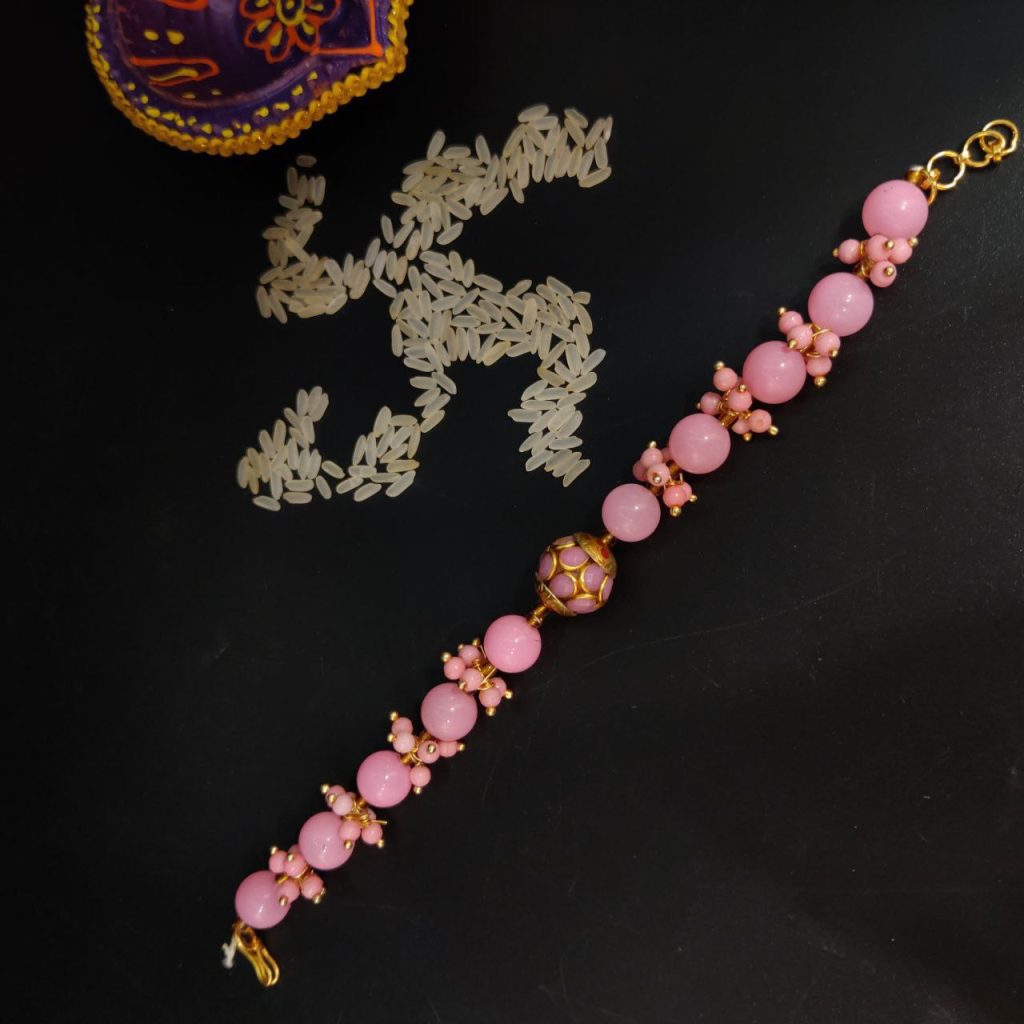 Pacchi Beads Bhaiya Rakhi With Golden Baby Pink pearl Work