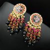 Traditional gold-plated Meenakari earrings with intricate enamel work.