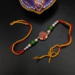 Delicate Kundan Meena Work Rakhi with Timeless Beauty