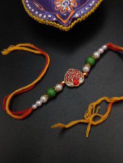 Delicate Kundan Meena Work Rakhi with Timeless Beauty