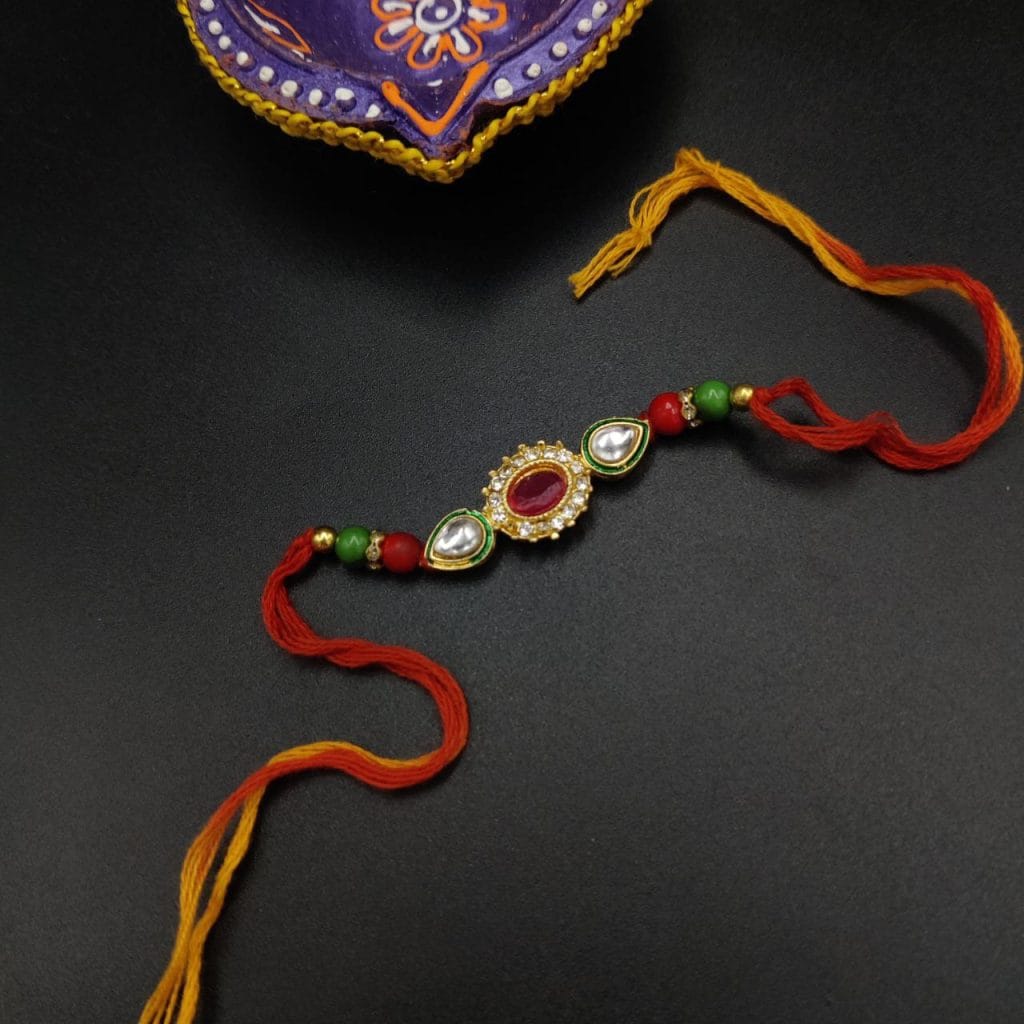 Captivating Kundan Meena Work Rakhi with Traditional Elegance