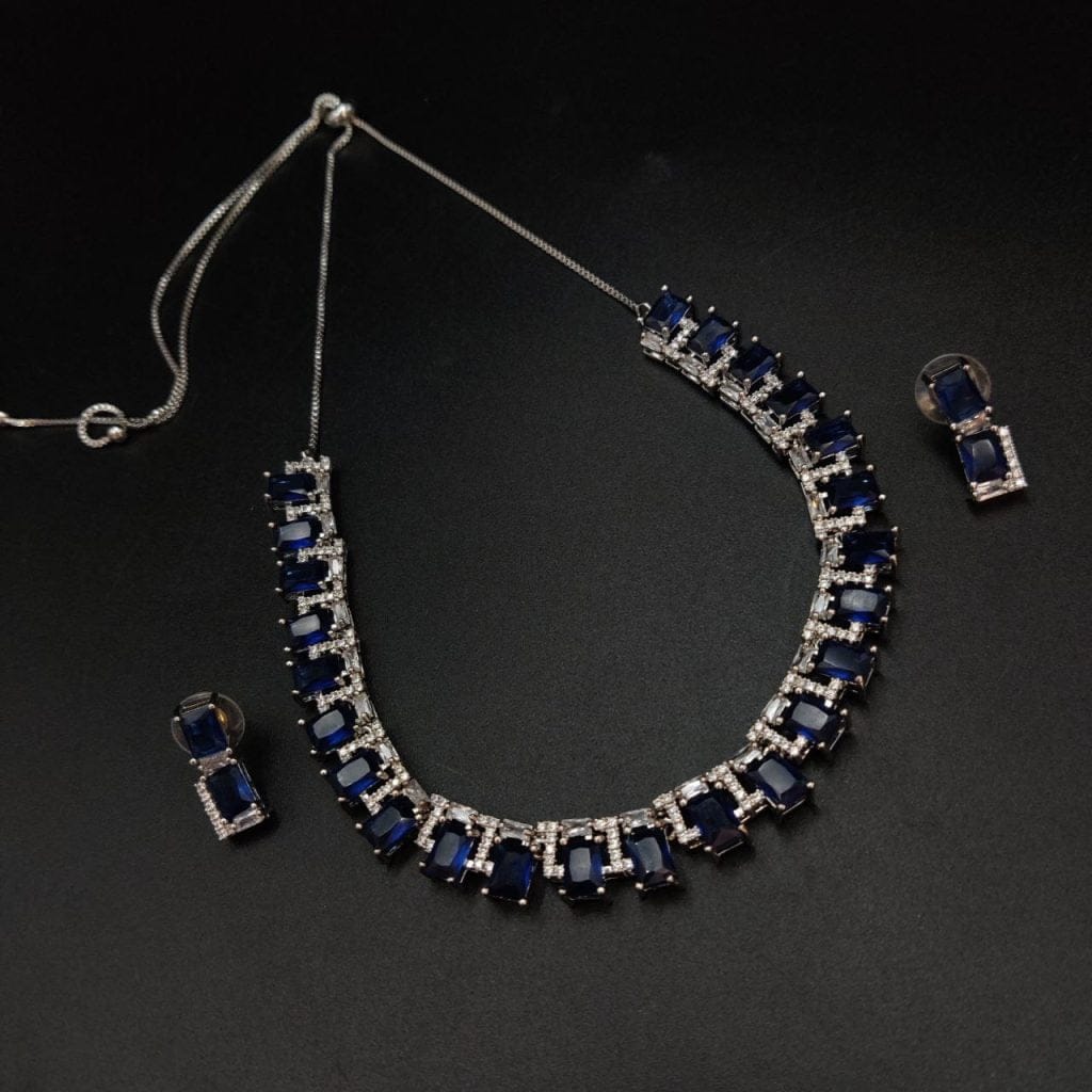 Intricate pendant necklace set with American diamonds