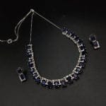 Intricate pendant necklace set with American diamonds