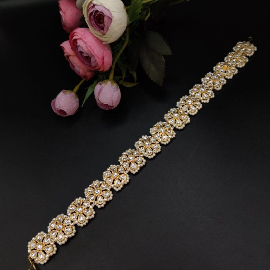 Graceful and ornate gold plated Shish Patti headpiece with filigree and stones