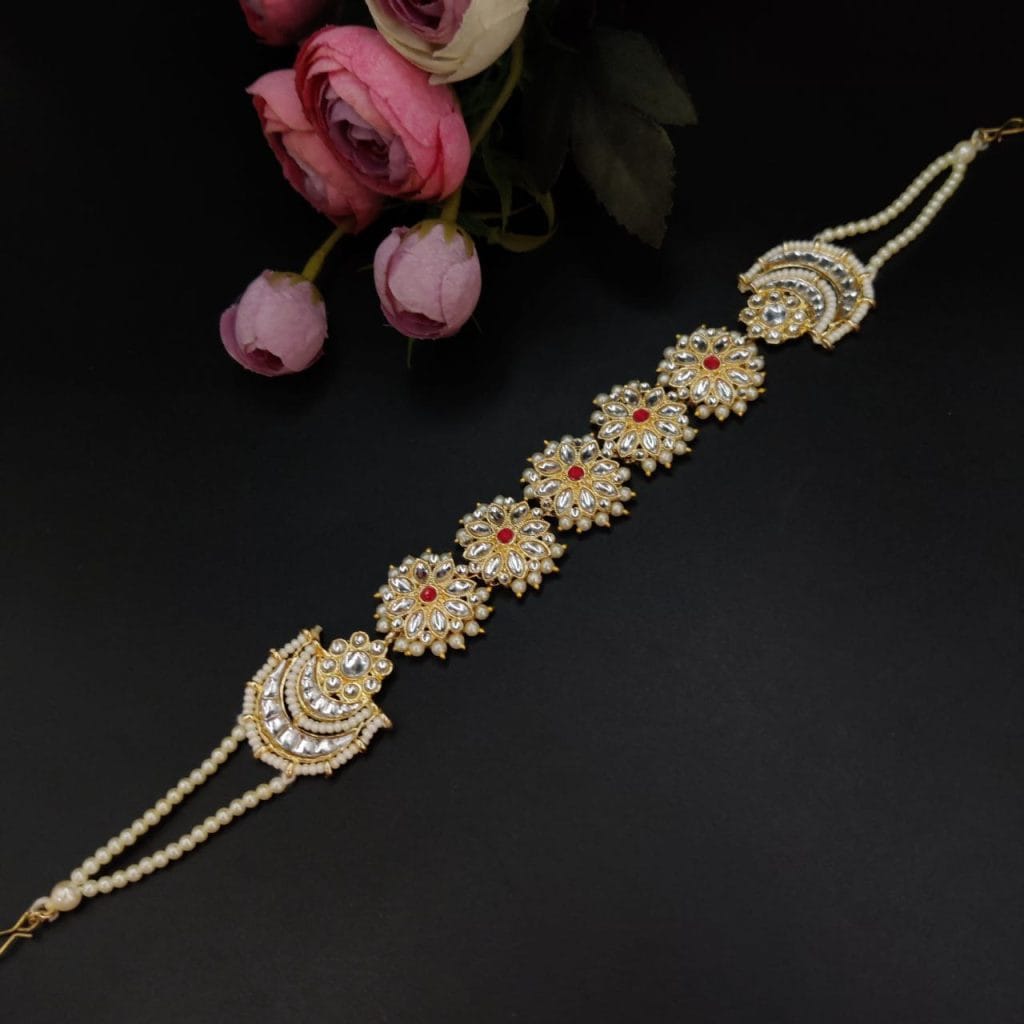 Enhance your ethnic look with the gold plated Shish Patti for a touch of tradition