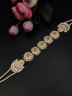 Enhance your ethnic look with the gold plated Shish Patti for a touch of tradition