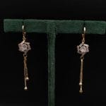 D9 Creation's trendy AD earrings with screw-back design