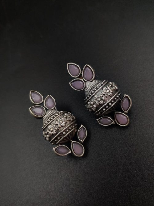 Silver flower pot earrings inspired by Kalash culture, crafted with intricate silver detailing.