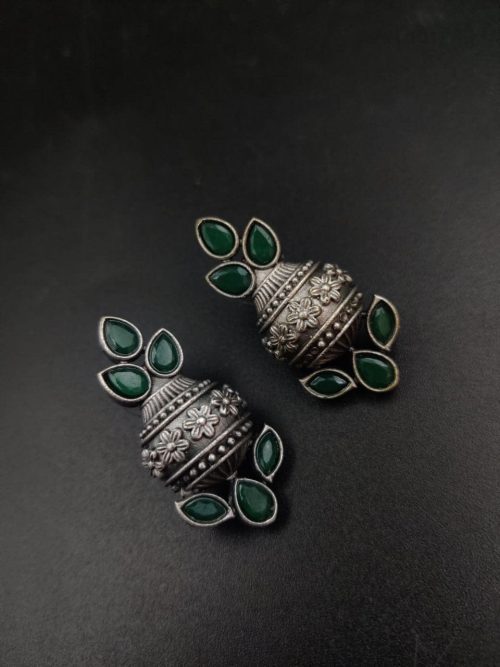 Silver flower pot earrings inspired by Kalash culture, crafted with intricate silver detailing.