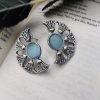 Silver Replica Monalisa Stone Earrings - Timeless elegance captured in sterling silver with captivating Monalisa Stones.