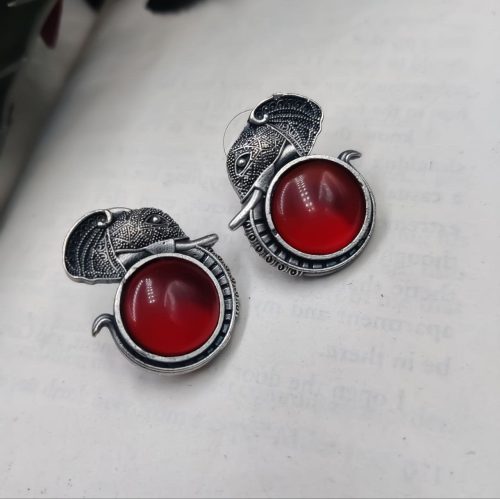 Silver replica elephant design earrings with Monalisa stone studs, perfect for casual wear