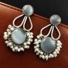 Hand-made silver earrings featuring a stone resembling the Monalisa Stone