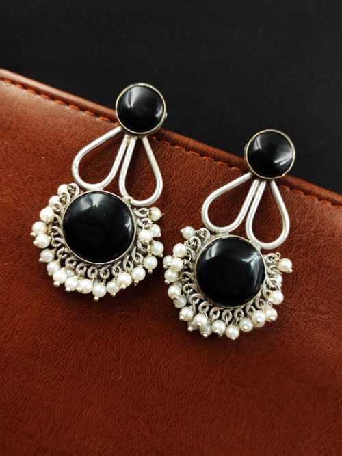 Hand-made silver earrings featuring a stone resembling the Monalisa Stone