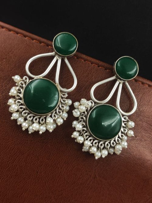 Hand-made silver earrings featuring a stone resembling the Monalisa Stone
