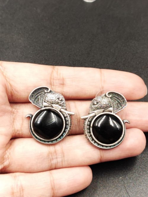 Adorable silver replica elephant design earrings with Monalisa stone studs, perfect for casual wear