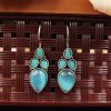 Artistic Elegance: Mona Lisa Inspired Silver Hook Earrings for Girls