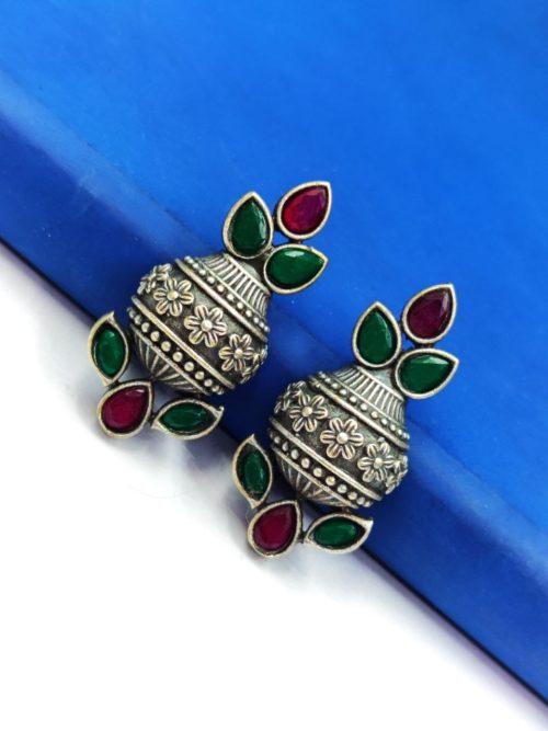 Silver flower pot earrings inspired by Kalash culture, crafted with intricate silver detailing.
