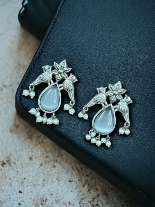 Affordable silver-look oxidized stud earrings featuring a bird-inspired design with premium stones for a sophisticated yet budget-friendly look