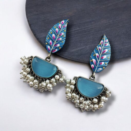 Handmade Painting Earrings with intricate hand-painted designs and silver replica oxidized finish featuring stone embellishments.