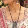 Antique Floral Art Pendant Set featuring a silver replica necklace with intricate floral design and matching earrings.