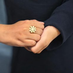 Gold-plated adjustable flower design ring made from premium brass metal.