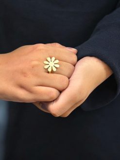Gold-plated adjustable flower design ring made from premium brass metal.