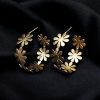 Gold-plated Bali-style designer flower earrings with a contemporary touch.