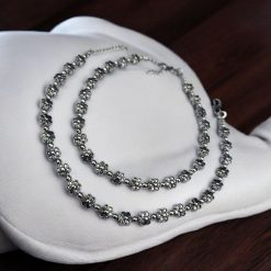 Premium Floral Silver Anklet with S-Lock, designed for everyday wear, featuring silver beads and a secure closure