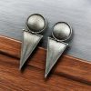 "Perfectly crafted silver replica antique brass stud earrings with vintage design."