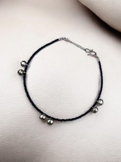 Elegant silver ghungroo anklet with blackbead detailing and ghungroos, designed for versatility and every occasion