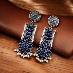 Elegant brass stud earrings with sparkling stone detailing, perfect for all occasions and versatile enough to pair with traditional and modern outfits