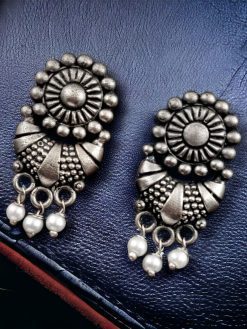 Antique silver replica brass stud earrings with vintage-inspired design, perfect for adding timeless elegance to any outfit.