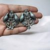 Antique-style silver replica bird stud earrings in brass with intricate vintage design, perfect for traditional and modern outfits