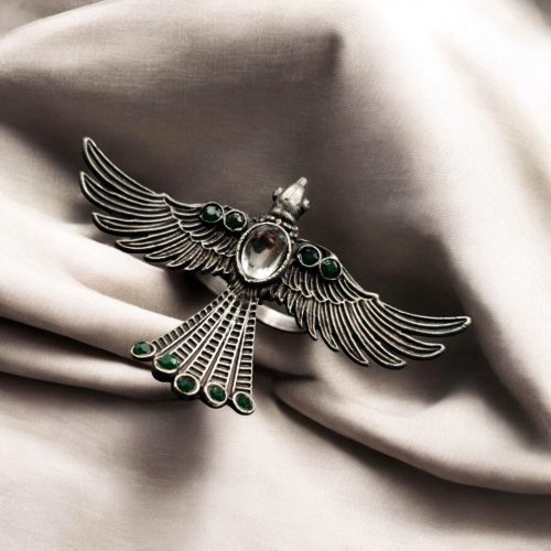 Brass bird ring with sparkling stones, featuring an elegant and intricate design perfect for any occasion.