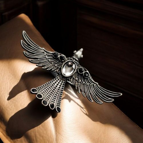 Brass bird ring with sparkling stones, featuring an elegant and intricate design perfect for any occasion.