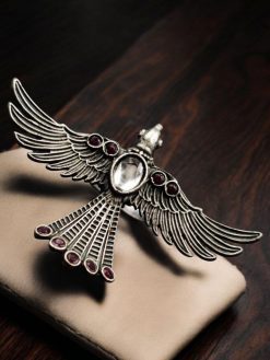 "Brass bird ring with sparkling stones, featuring an elegant and intricate design perfect for any occasion.