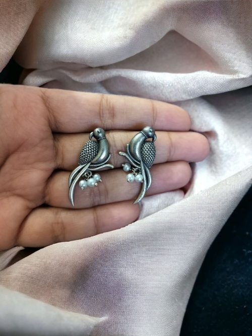 Elegant parrot design brass earrings featuring intricate craftsmanship, lightweight structure, and a timeless charm, perfect for festive and casual occasions.