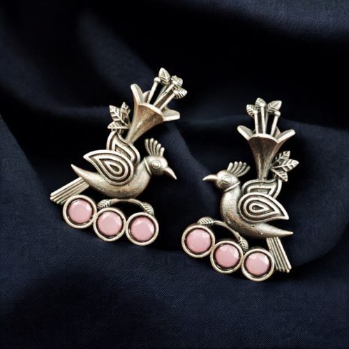 Elegant brass stud earrings featuring intricate bird motifs and sparkling stone details, offering a lightweight and sophisticated design perfect for any occasion.