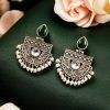 A pair of elegant stone stud earrings made from premium brass, featuring sparkling stones, perfect for every occasion.