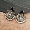 A pair of elegant stone stud earrings made from premium brass, featuring sparkling stones, perfect for every occasion.