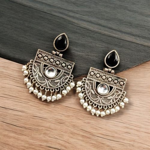 A pair of elegant stone stud earrings made from premium brass, featuring sparkling stones, perfect for every occasion."