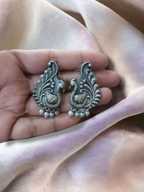 Perfect Brass Peacock Stud Earrings with intricate design, ideal for enhancing traditional and modern outfits