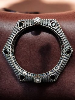 Elegant openable brass stone kada bracelet with intricate stone detailing and adjustable fit. Caption: