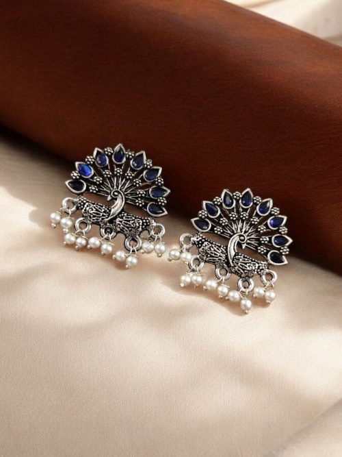 Elegant German silver peacock stud earrings with intricate stone work, perfect for every occasion.