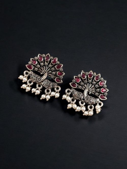 Elegant German silver peacock stud earrings with intricate stone work, perfect for every occasion.