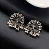 Elegant German silver peacock stud earrings with intricate stone work, perfect for every occasion.