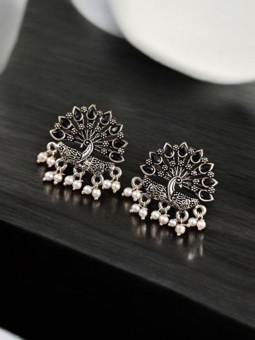 Elegant German silver peacock stud earrings with intricate stone work, perfect for every occasion.