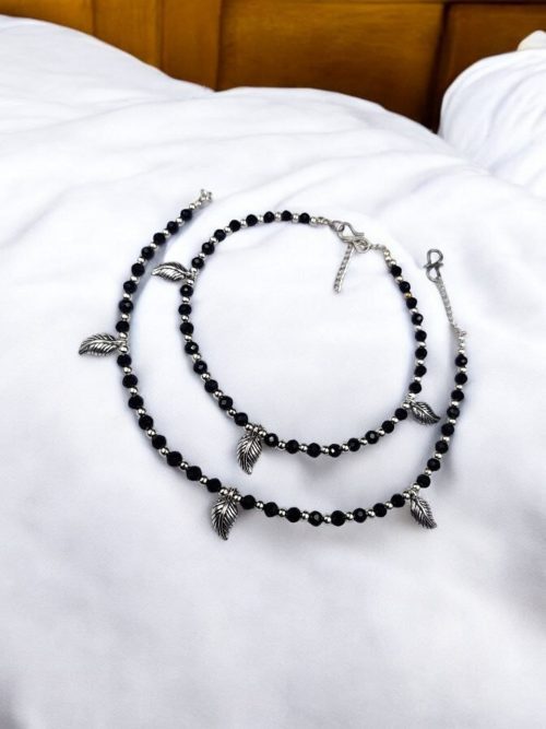 Stylish oxidised leaf anklet adorned with crystal beads, perfect for daily use and versatile wear
