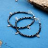 Stylish oxidised leaf anklet adorned with crystal beads, perfect for daily use and versatile wear